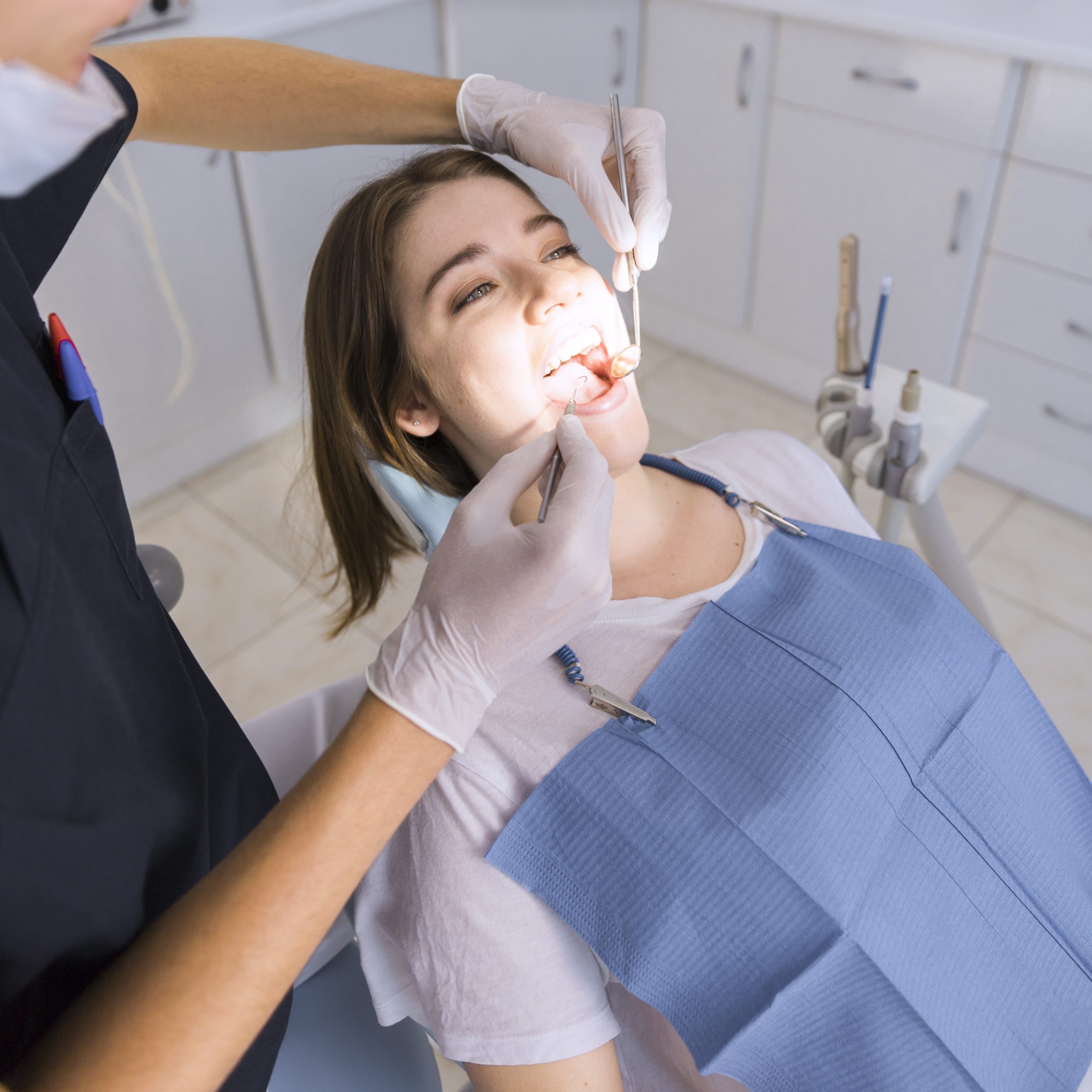 https://drpunga.md/wp-content/uploads/2026/01/close-up-woman-getting-dental-check-up-scaled.jpg